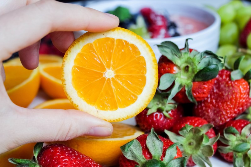 Orange slice with additional fruit